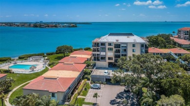 Located in the walkable and charming island community of Isla on Isla Del Sol Yacht and Country Club in Florida - for sale on GolfHomes.com, golf home, golf lot