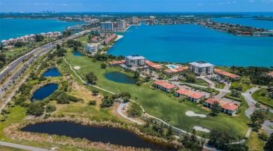 Located in the walkable and charming island community of Isla on Isla Del Sol Yacht and Country Club in Florida - for sale on GolfHomes.com, golf home, golf lot