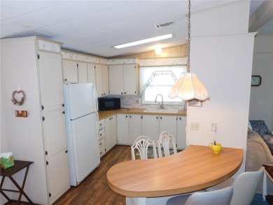 This charming, fully furnished home is perfect for both relaxing on Betmar Acres Golf Club in Florida - for sale on GolfHomes.com, golf home, golf lot