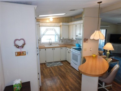 This charming, fully furnished home is perfect for both relaxing on Betmar Acres Golf Club in Florida - for sale on GolfHomes.com, golf home, golf lot