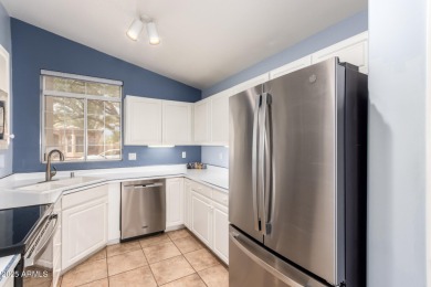 Charming and immaculately maintained home in one of the best on Coyote Lakes Golf Club in Arizona - for sale on GolfHomes.com, golf home, golf lot