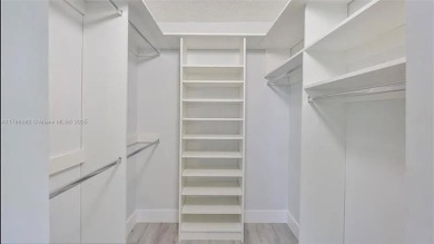 Buyer fell through--this beautifully updated corner unit is on Flamingo Lakes Country Club in Florida - for sale on GolfHomes.com, golf home, golf lot