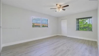 Buyer fell through--this beautifully updated corner unit is on Flamingo Lakes Country Club in Florida - for sale on GolfHomes.com, golf home, golf lot