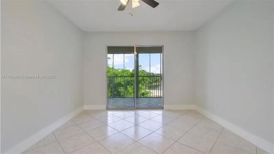 Buyer fell through--this beautifully updated corner unit is on Flamingo Lakes Country Club in Florida - for sale on GolfHomes.com, golf home, golf lot