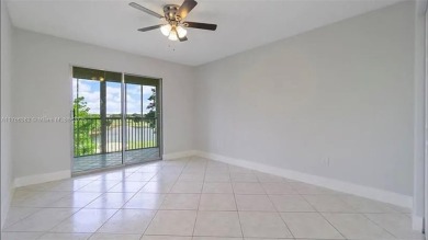 Buyer fell through--this beautifully updated corner unit is on Flamingo Lakes Country Club in Florida - for sale on GolfHomes.com, golf home, golf lot