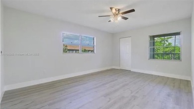 Buyer fell through--this beautifully updated corner unit is on Flamingo Lakes Country Club in Florida - for sale on GolfHomes.com, golf home, golf lot
