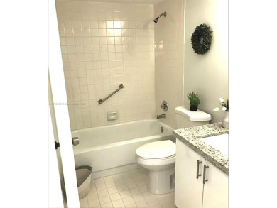 Buyer fell through--this beautifully updated corner unit is on Flamingo Lakes Country Club in Florida - for sale on GolfHomes.com, golf home, golf lot