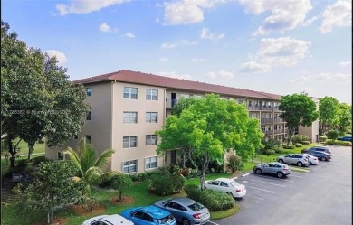 Buyer fell through--this beautifully updated corner unit is on Flamingo Lakes Country Club in Florida - for sale on GolfHomes.com, golf home, golf lot