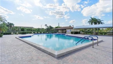 Buyer fell through--this beautifully updated corner unit is on Flamingo Lakes Country Club in Florida - for sale on GolfHomes.com, golf home, golf lot