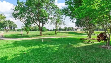 Buyer fell through--this beautifully updated corner unit is on Flamingo Lakes Country Club in Florida - for sale on GolfHomes.com, golf home, golf lot