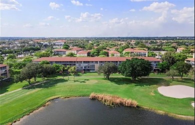 Buyer fell through--this beautifully updated corner unit is on Flamingo Lakes Country Club in Florida - for sale on GolfHomes.com, golf home, golf lot