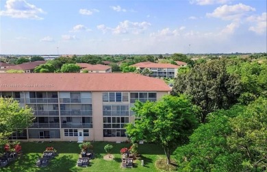 Buyer fell through--this beautifully updated corner unit is on Flamingo Lakes Country Club in Florida - for sale on GolfHomes.com, golf home, golf lot
