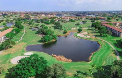 Buyer fell through--this beautifully updated corner unit is on Flamingo Lakes Country Club in Florida - for sale on GolfHomes.com, golf home, golf lot