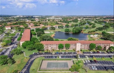 Buyer fell through--this beautifully updated corner unit is on Flamingo Lakes Country Club in Florida - for sale on GolfHomes.com, golf home, golf lot