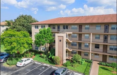 Buyer fell through--this beautifully updated corner unit is on Flamingo Lakes Country Club in Florida - for sale on GolfHomes.com, golf home, golf lot