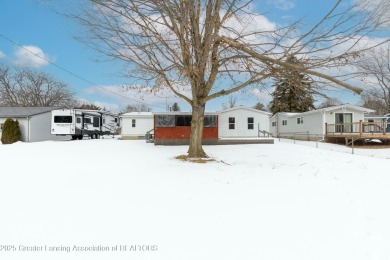 Step into this practical 3-bedroom, 2.5-bath home featuring on Oak Lane Golf Course, Inc. in Michigan - for sale on GolfHomes.com, golf home, golf lot