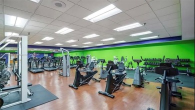 Buyer fell through--this beautifully updated corner unit is on Flamingo Lakes Country Club in Florida - for sale on GolfHomes.com, golf home, golf lot
