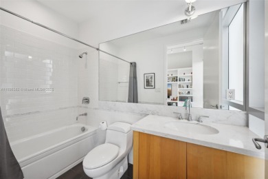 Exclusive private island living at AQUA on glamorous Allison on La Gorce Country Club in Florida - for sale on GolfHomes.com, golf home, golf lot