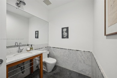 Exclusive private island living at AQUA on glamorous Allison on La Gorce Country Club in Florida - for sale on GolfHomes.com, golf home, golf lot