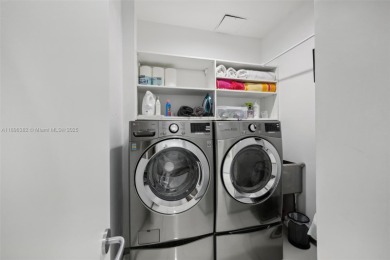 Exclusive private island living at AQUA on glamorous Allison on La Gorce Country Club in Florida - for sale on GolfHomes.com, golf home, golf lot