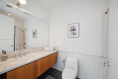 Exclusive private island living at AQUA on glamorous Allison on La Gorce Country Club in Florida - for sale on GolfHomes.com, golf home, golf lot