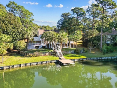 Escape to your own private oasis at this stunning lakefront home on Rocky Bayou Country Club in Florida - for sale on GolfHomes.com, golf home, golf lot