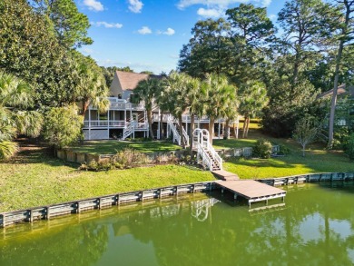 Escape to your own private oasis at this stunning lakefront home on Rocky Bayou Country Club in Florida - for sale on GolfHomes.com, golf home, golf lot