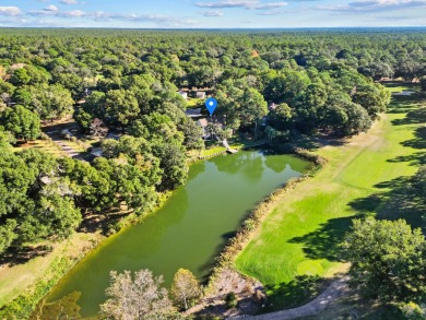 Escape to your own private oasis at this stunning lakefront home on Rocky Bayou Country Club in Florida - for sale on GolfHomes.com, golf home, golf lot