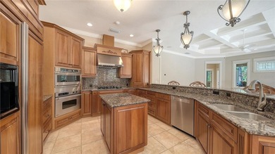 Located on a quiet cul-de-sac within the gates of The Oaks on The Oaks Club in Florida - for sale on GolfHomes.com, golf home, golf lot