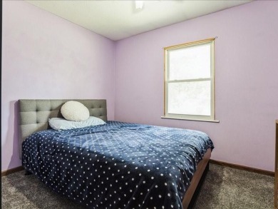 Situated on a 160' deep lot that backs up to St. Andrews Golf on St. Andrews Golf Club in Iowa - for sale on GolfHomes.com, golf home, golf lot