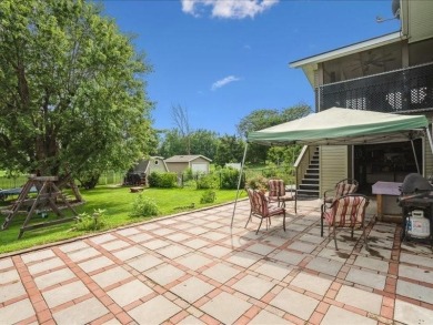 Situated on a 160' deep lot that backs up to St. Andrews Golf on St. Andrews Golf Club in Iowa - for sale on GolfHomes.com, golf home, golf lot