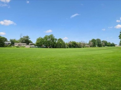Situated on a 160' deep lot that backs up to St. Andrews Golf on St. Andrews Golf Club in Iowa - for sale on GolfHomes.com, golf home, golf lot