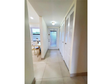 BEAUTIFUL MOVE IN READY, PARTIALLY FURNISHED 2/2 THIRD FLOOR on Sunrise Lakes Phase IV Golf Course in Florida - for sale on GolfHomes.com, golf home, golf lot