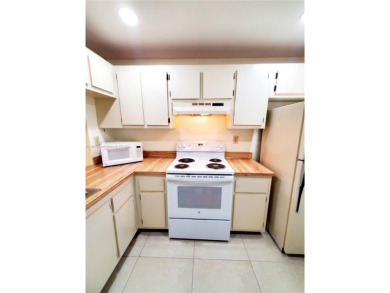 BEAUTIFUL MOVE IN READY, PARTIALLY FURNISHED 2/2 THIRD FLOOR on Sunrise Lakes Phase IV Golf Course in Florida - for sale on GolfHomes.com, golf home, golf lot