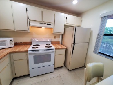 BEAUTIFUL MOVE IN READY, PARTIALLY FURNISHED 2/2 THIRD FLOOR on Sunrise Lakes Phase IV Golf Course in Florida - for sale on GolfHomes.com, golf home, golf lot
