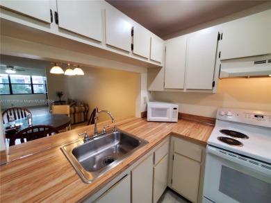 BEAUTIFUL MOVE IN READY, PARTIALLY FURNISHED 2/2 THIRD FLOOR on Sunrise Lakes Phase IV Golf Course in Florida - for sale on GolfHomes.com, golf home, golf lot