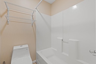 Welcome to this beautifully maintained 2-bedroom, 2-bath third on River Oaks Golf Plantation  in South Carolina - for sale on GolfHomes.com, golf home, golf lot