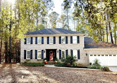 Discover the charm of classic all-brick Colonial homes in the on MacGregor Downs Country Club in North Carolina - for sale on GolfHomes.com, golf home, golf lot