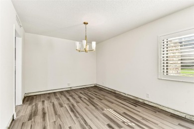 Under contract-accepting backup offers. Three bedroom/Two Bath - on Innisbrook Resort and Golf Club in Florida - for sale on GolfHomes.com, golf home, golf lot