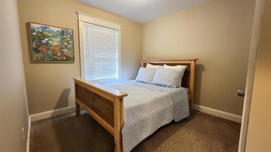 Welcome to your Northern Michigan retreat--just minutes from on Little Traverse Bay Golf Club and Restaurant in Michigan - for sale on GolfHomes.com, golf home, golf lot