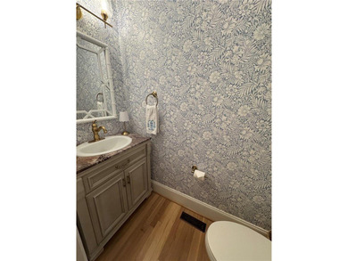 Beautiful brick-front traditional home located on the 7th hole on Williamsburg National Golf Club in Virginia - for sale on GolfHomes.com, golf home, golf lot