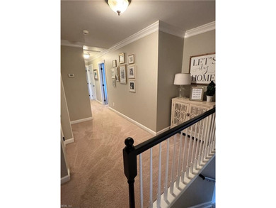 Beautiful brick-front traditional home located on the 7th hole on Williamsburg National Golf Club in Virginia - for sale on GolfHomes.com, golf home, golf lot