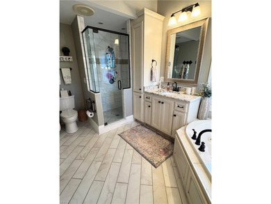 Beautiful brick-front traditional home located on the 7th hole on Williamsburg National Golf Club in Virginia - for sale on GolfHomes.com, golf home, golf lot