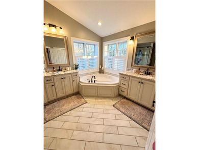 Beautiful brick-front traditional home located on the 7th hole on Williamsburg National Golf Club in Virginia - for sale on GolfHomes.com, golf home, golf lot