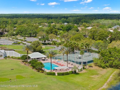 Embark on the pinnacle of Luxury Living at the esteemed Glen on Glen Lakes Country Club in Florida - for sale on GolfHomes.com, golf home, golf lot