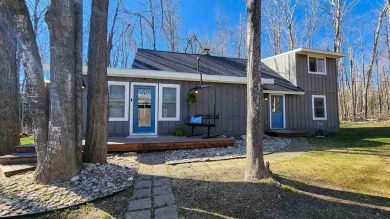 Welcome to your Northern Michigan retreat--just minutes from on Little Traverse Bay Golf Club and Restaurant in Michigan - for sale on GolfHomes.com, golf home, golf lot