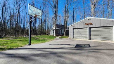 Welcome to your Northern Michigan retreat--just minutes from on Little Traverse Bay Golf Club and Restaurant in Michigan - for sale on GolfHomes.com, golf home, golf lot