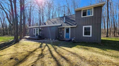 Welcome to your Northern Michigan retreat--just minutes from on Little Traverse Bay Golf Club and Restaurant in Michigan - for sale on GolfHomes.com, golf home, golf lot
