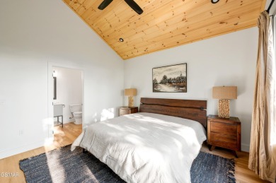 This newly constructed, fully furnished 4-bedroom, 4.5-bathroom on Sevierville Golf Club in Tennessee - for sale on GolfHomes.com, golf home, golf lot