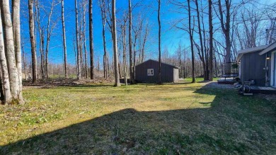 Welcome to your Northern Michigan retreat--just minutes from on Little Traverse Bay Golf Club and Restaurant in Michigan - for sale on GolfHomes.com, golf home, golf lot